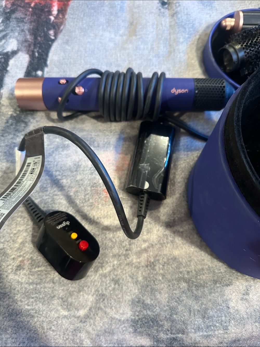 Dyson hair styler in purple and rose gold accents